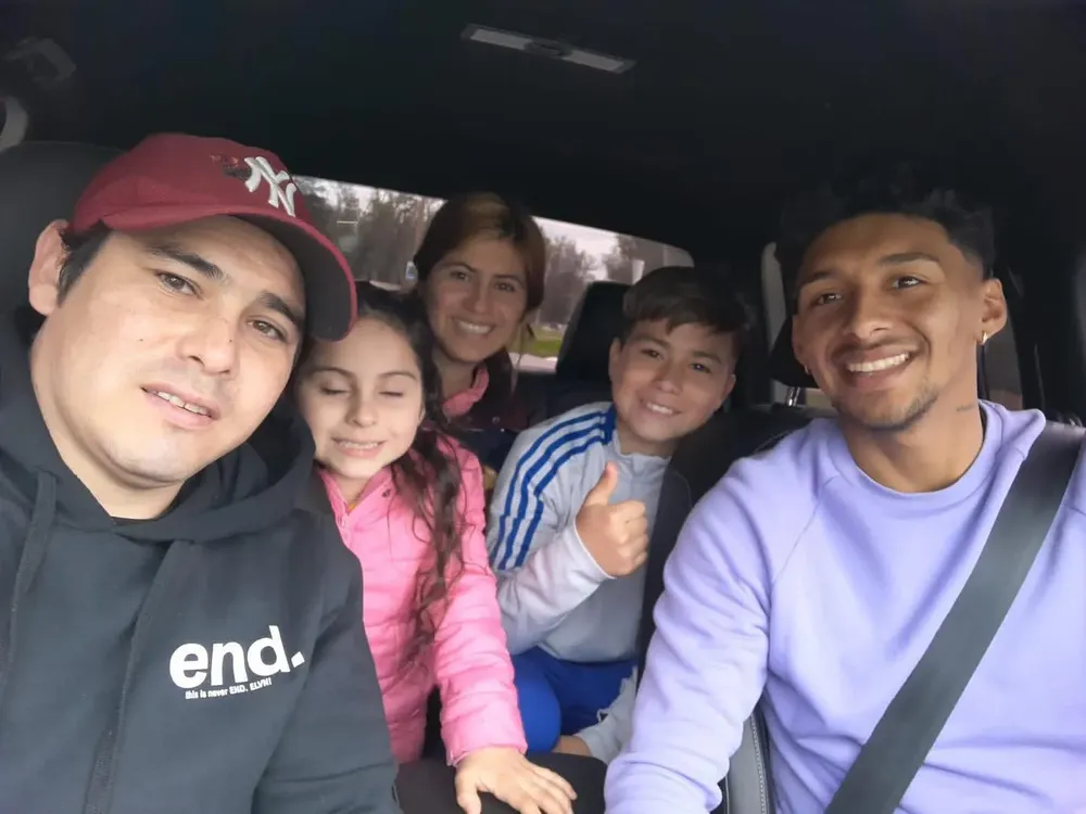 Junior y flía con jugador de Boca