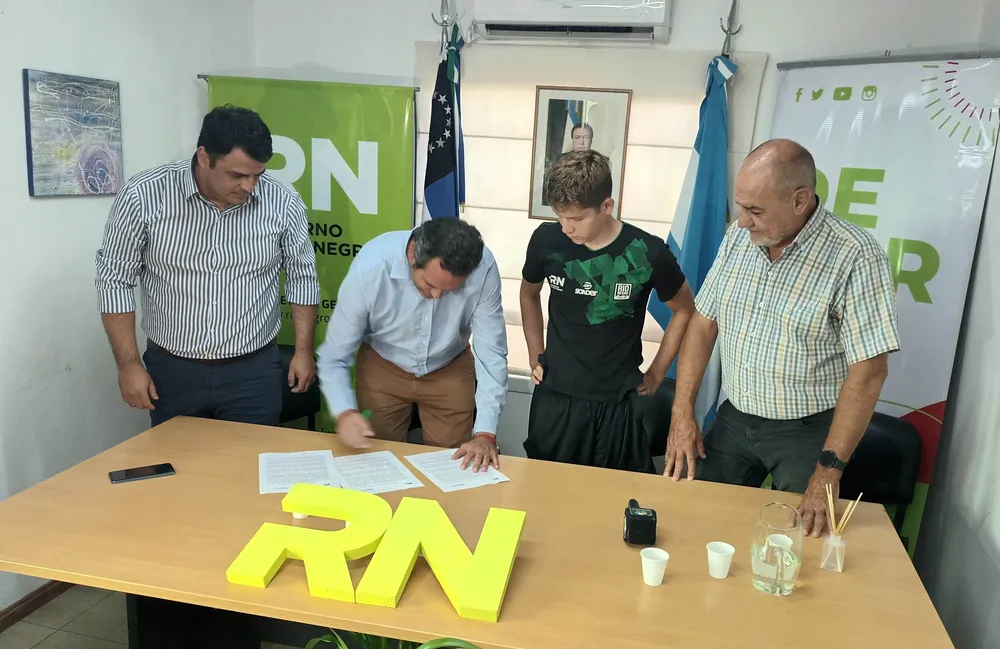 Lolo Heredia firma convenio