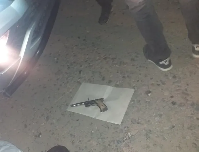 detenidos arma de fuego